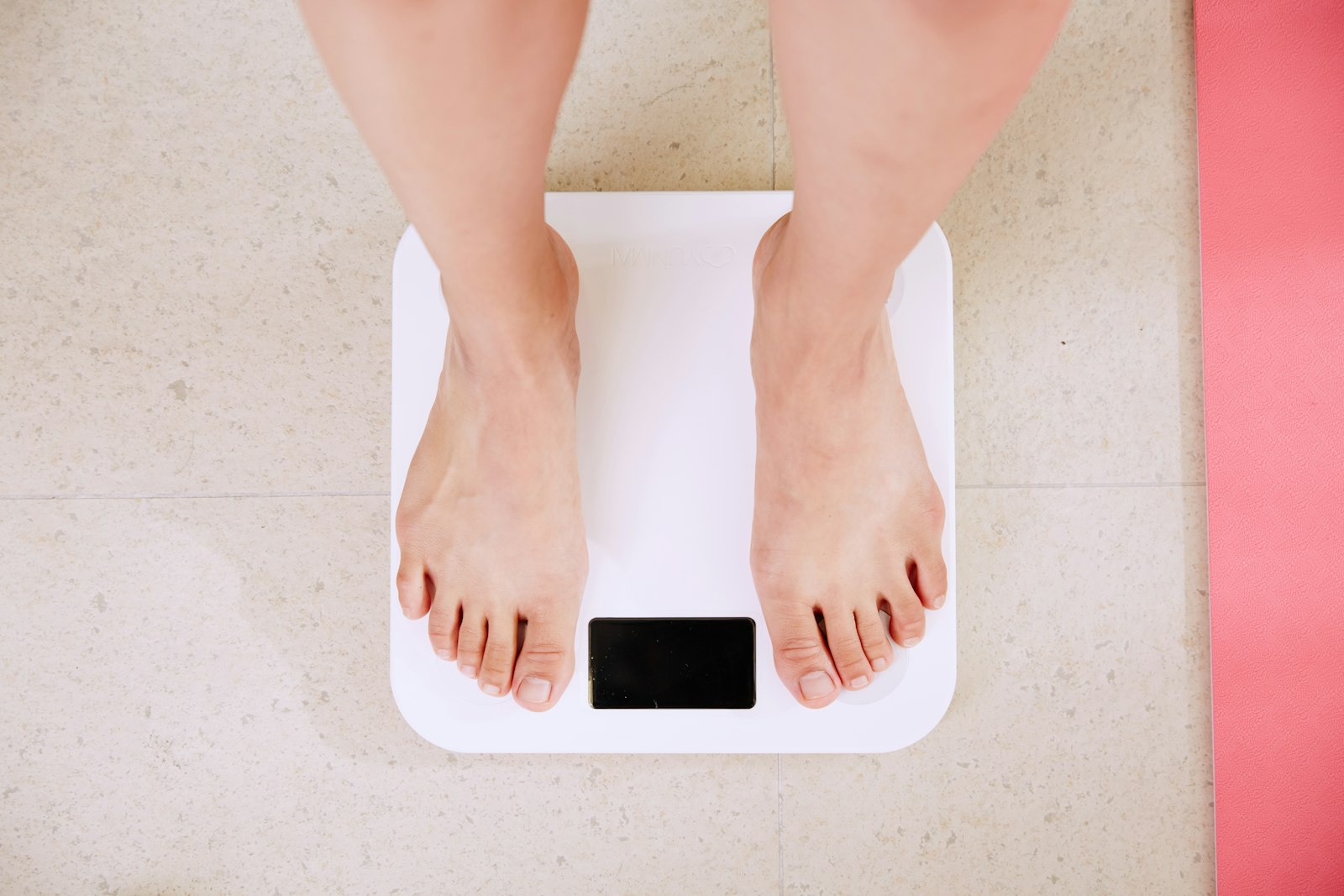 Digital bathroom scale, representative photo