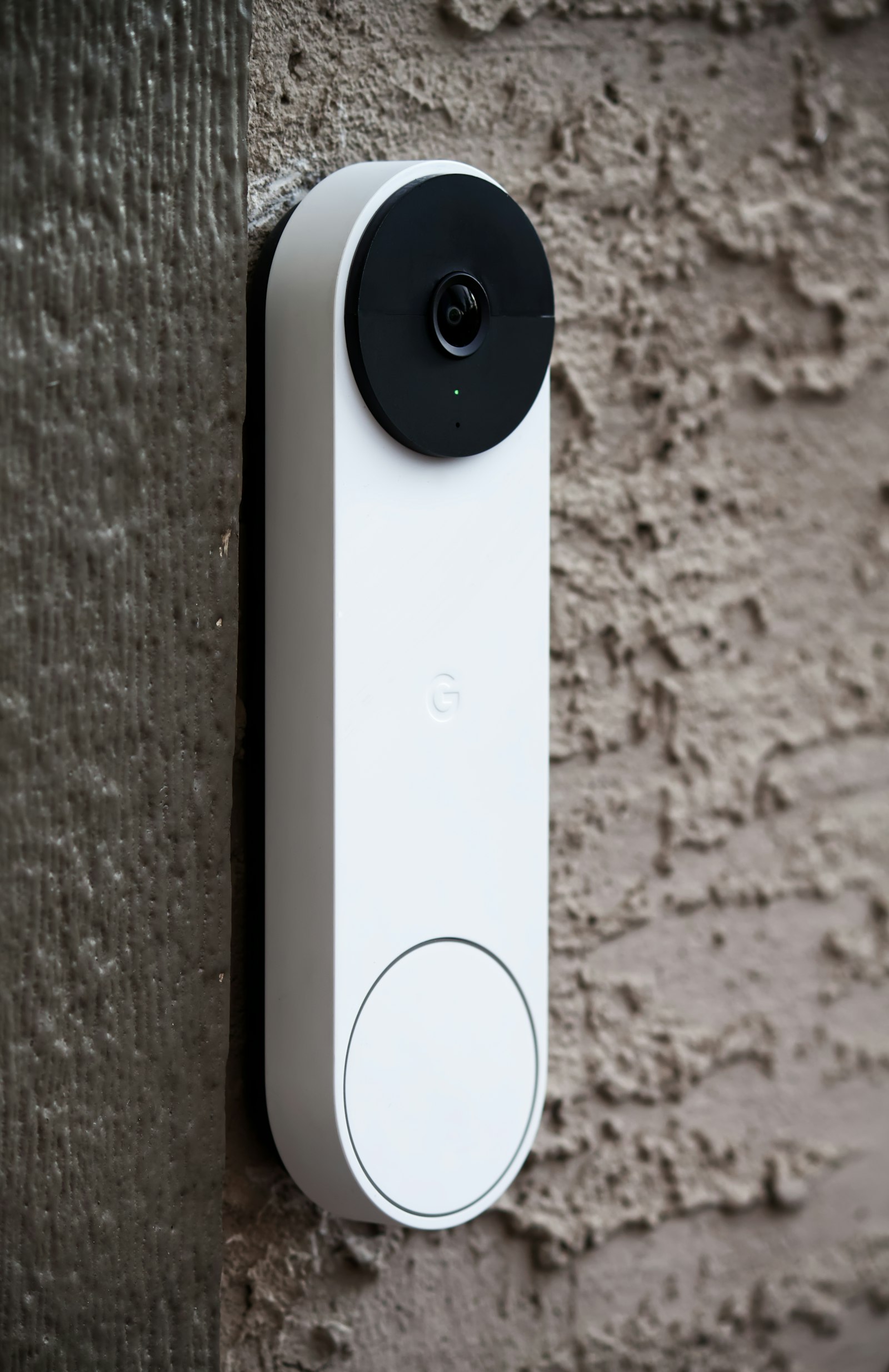 Smart video doorbell mounted on a wall